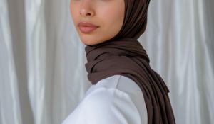 Close up shot of a woman wearing a dark brown premium jersey hijab