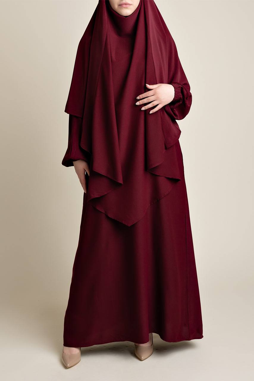 Matching Abaya and Khimar set in a radiant maroon color.
